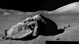 A gray rock sits on a gray surface