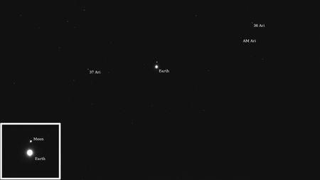 several white orbs on a black background